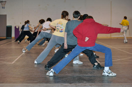 Beginner's class doing footwork drill